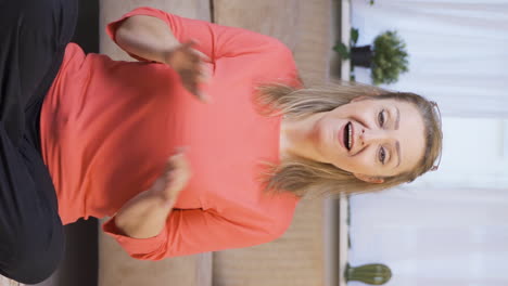 Vertical-video-of-Excited-woman.
